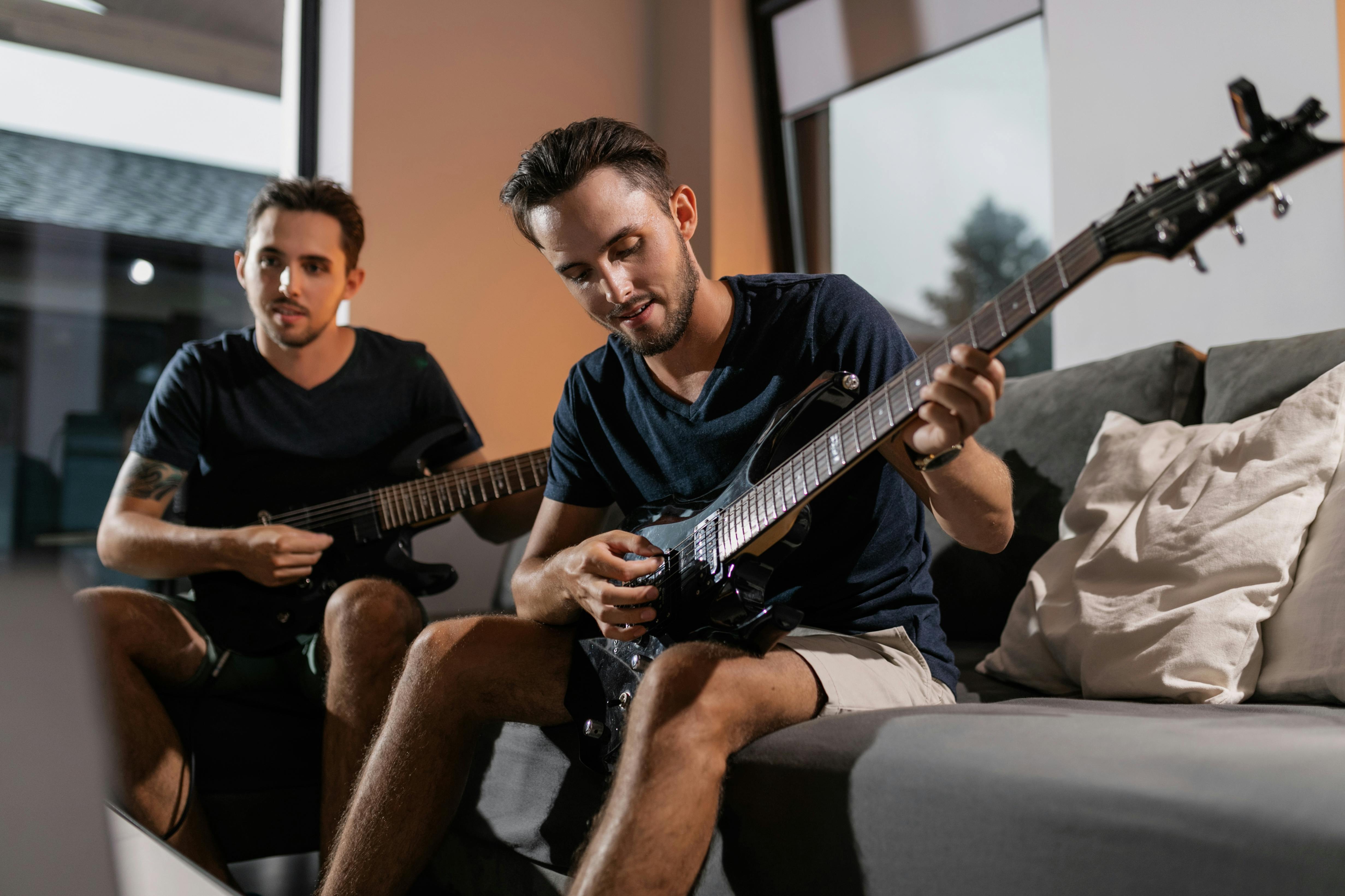 Beginner playing easy songs on guitar